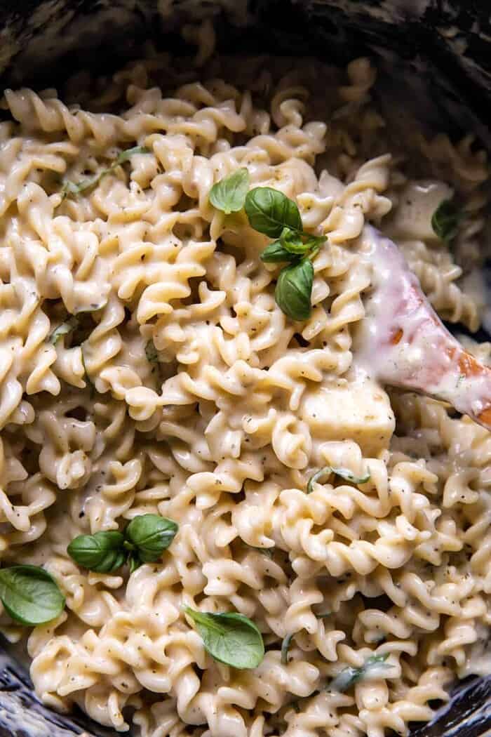 One Pot 4 Cheese Caprese Mac and Cheese | halfbakedharvest.com overhead prep photo of One Pot 4 Cheese Caprese Mac and Cheese in pot before baking