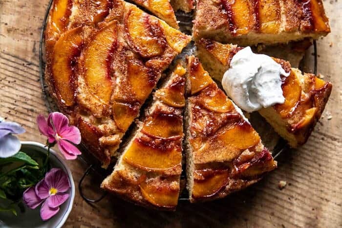 Skillet Cinnamon Sugar Peach Upside Down Cake | halfbakedharvest.com overhead horizontal photo of Skillet Cinnamon Sugar Peach Upside Down Cake