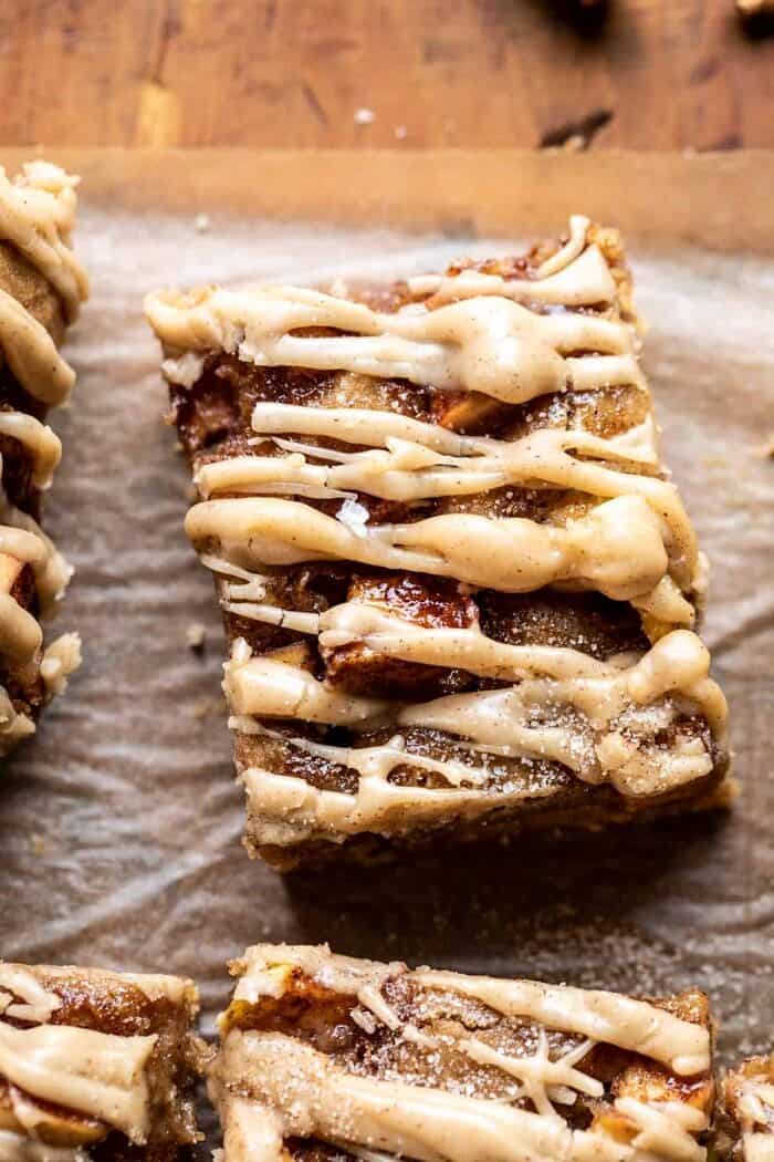 Brown Butter Apple Blondies with Cinnamon Maple Glaze | halfbakedharvest.com overhead close up photo of Brown Butter Apple Blondies with Cinnamon Maple Glaze