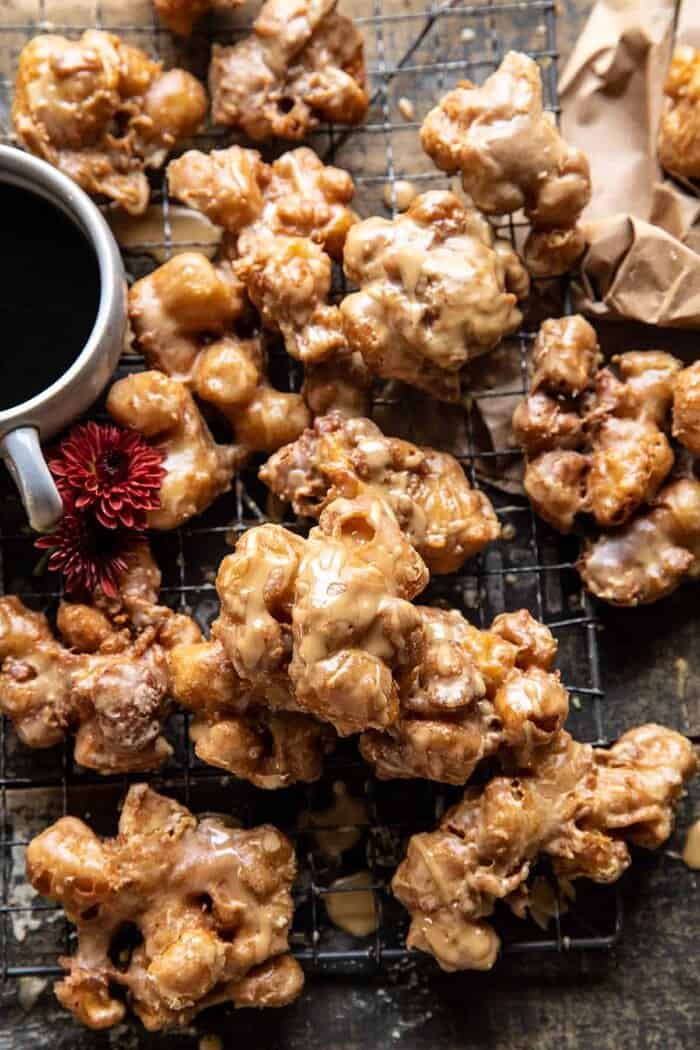 Cinnamon Spiced Apple Fritters with Vanilla Coffee Glaze | halfbakedharvest.com overhead photo of Cinnamon Spiced Apple Fritters with Vanilla Coffee Glaze