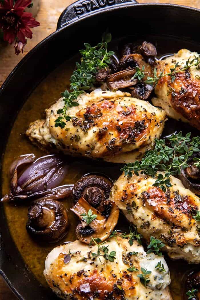 overhead close up photo of Herbed Ricotta Stuffed Chicken In White Wine Pan Sauce