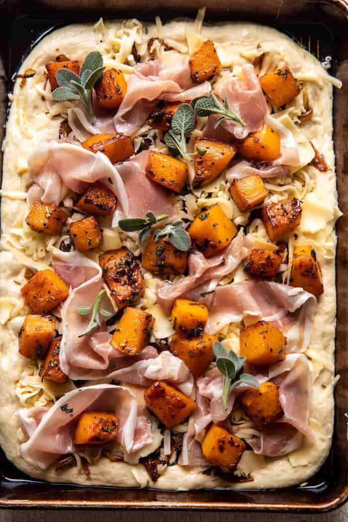 Roasted Butternut Squash Prosciutto Pizza with Caramelized Onions | halfbakedharvest.com prep photo of Roasted Butternut Squash Prosciutto Pizza before baking