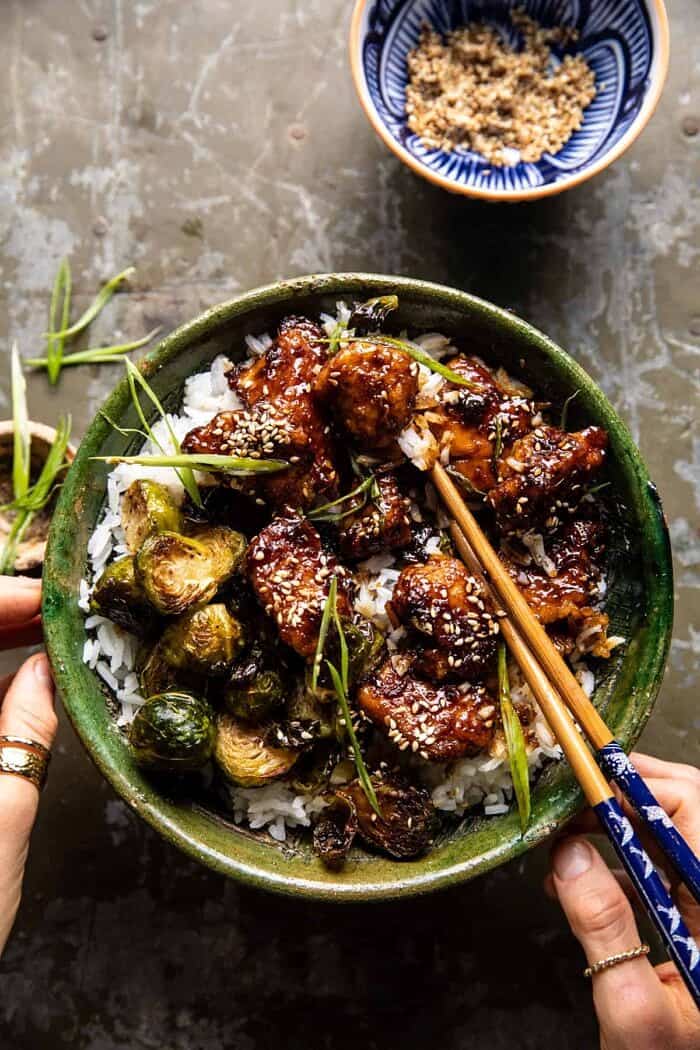 Sheet Pan Sticky Ginger Sesame Chicken and Crispy Brussels Sprouts | halfbakedharvest.com overhead photo of Sheet Pan Sticky Ginger Sesame Chicken and Crispy Brussels Sprouts