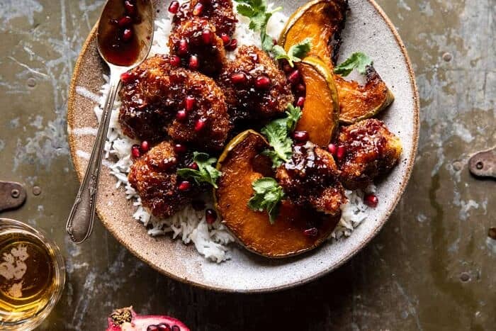 Sheet Pan Sticky Thai Pomegranate Chicken and Honey Roasted Squash | halfbakedharvest.com overhead horizontal photo of Sheet Pan Sticky Thai Pomegranate Chicken and Honey Roasted Squash