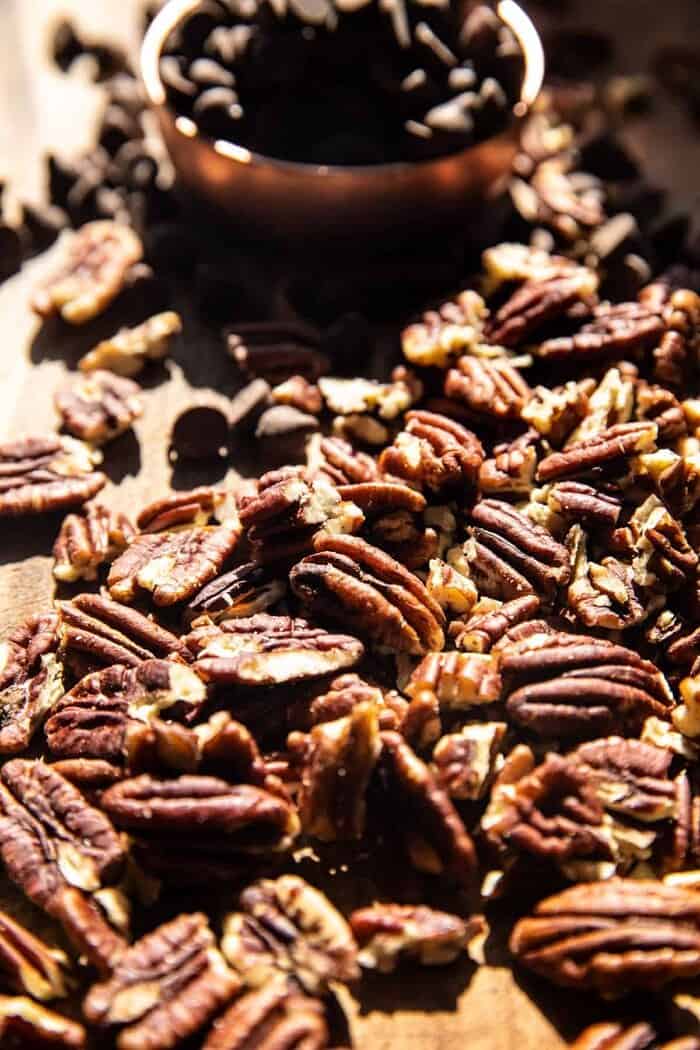 Brown Sugar Maple Chocolate Pecan Pie Bars | halfbakedharvest.com prep photo of pecans and chocolate chips