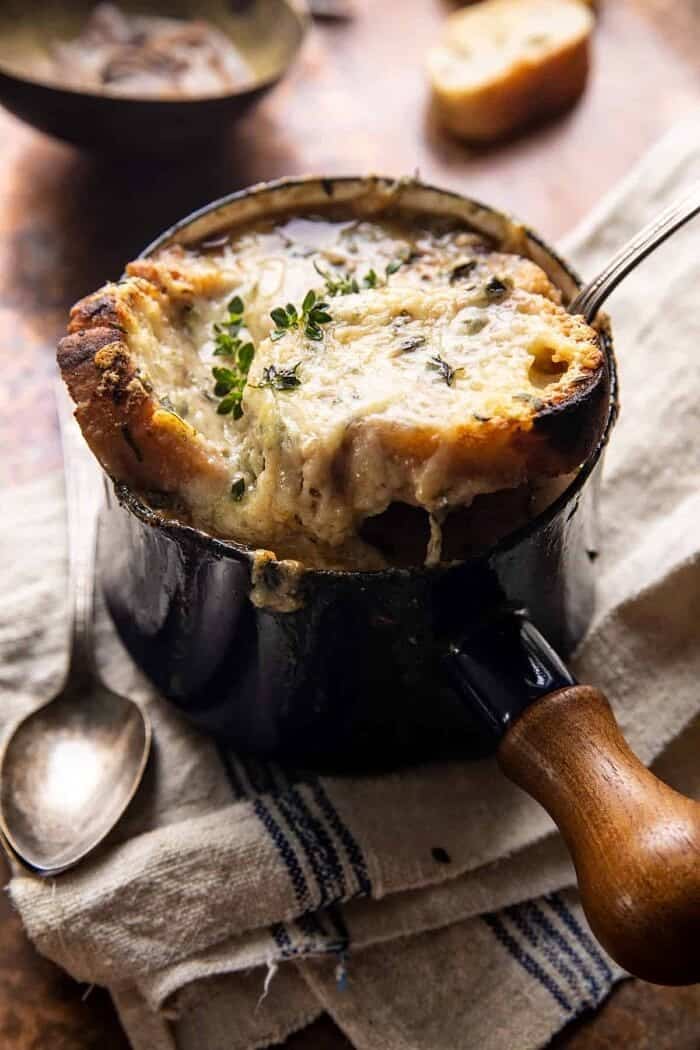 Creamy French Onion and Mushroom Soup | halfbakedharvest.com side angled photo of Creamy French Onion and Mushroom Soup