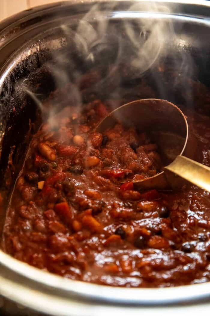 Healthy Slow Cooker Chipotle Bean Chili | halfbakedharvest.com prep photo of Healthy Slow Cooker Chipotle Bean Chili cooking in the slow cooker