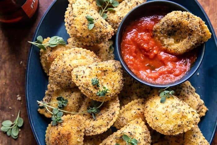 overhead close up photo of Oven Toasted Garlic Herb Cheese Ravioli 