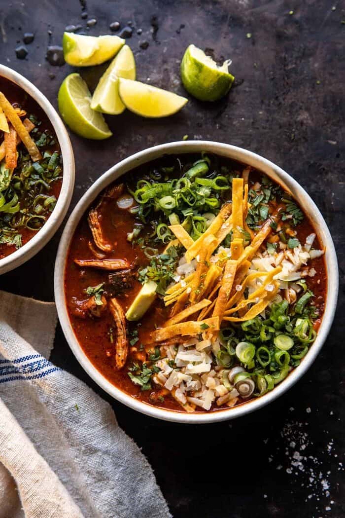 Slow Cooker Chipotle Chicken Tortilla Soup with Salty Lime Chips | halfbakedharvest.com overhead photo of Slow Cooker Chipotle Chicken Tortilla Soup with Salty Lime Chips