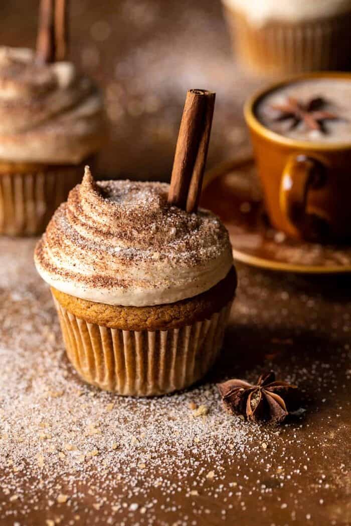 Vanilla Chai Pumpkin Latte Cupcakes with Cinnamon Brown Sugar Frosting | halfbakedhavest.com side angled photo Vanilla Chai Pumpkin Latte Cupcakes with Cinnamon Brown Sugar Frosting