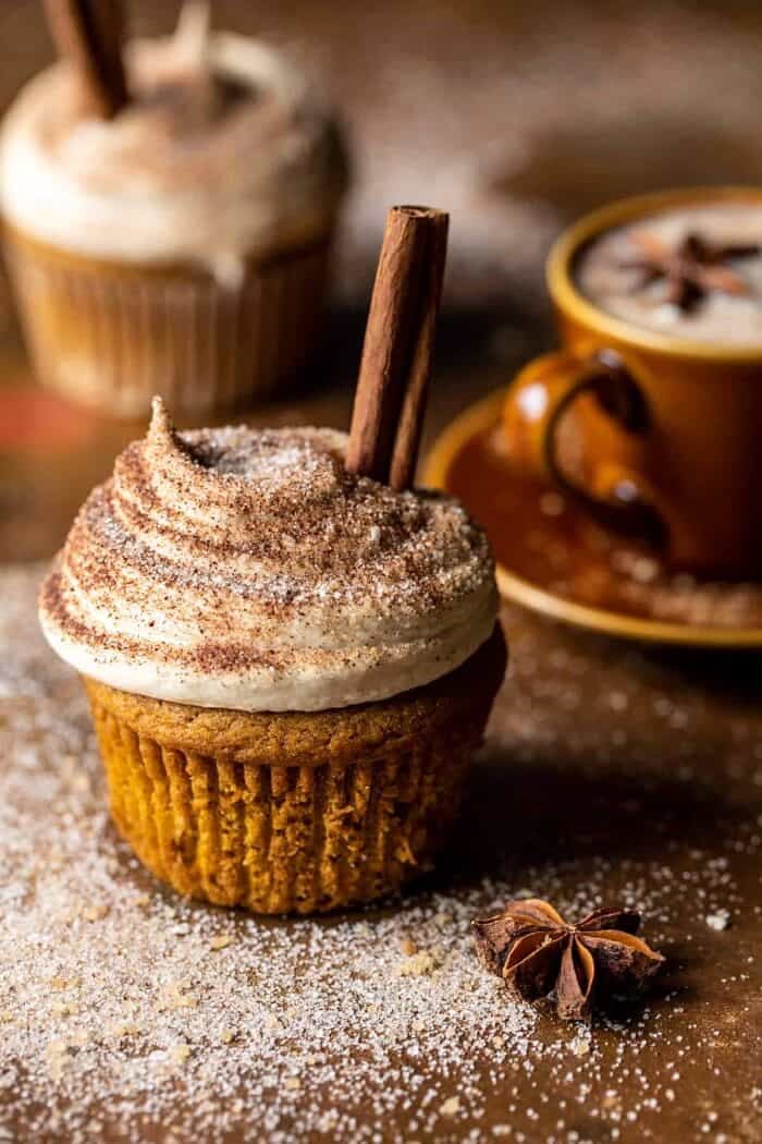 Vanilla Chai Pumpkin Latte Cupcakes with Cinnamon Brown Sugar Frosting | halfbakedhavest.com side agnled photo of Vanilla Chai Pumpkin Latte Cupcakes with Cinnamon Brown Sugar Frosting