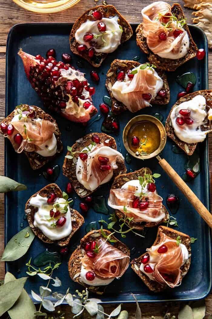 Honey Whipped Ricotta and Prosciutto Crackers | halfbakedharvest.com overhead photo of Honey Whipped Ricotta and Prosciutto Crackers