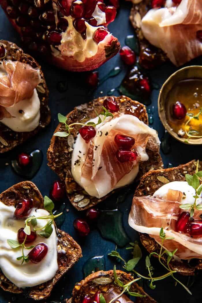 Honey Whipped Ricotta and Prosciutto Crackers | halfbakedharvest.com overhead close up photo of Honey Whipped Ricotta and Prosciutto Crackers