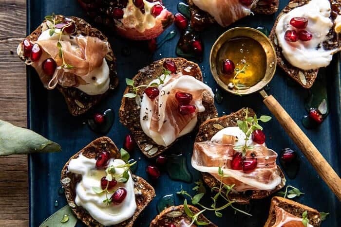 Honey Whipped Ricotta and Prosciutto Crackers | halfbakedharvest.com overhead horizontal photo of Honey Whipped Ricotta and Prosciutto Crackers