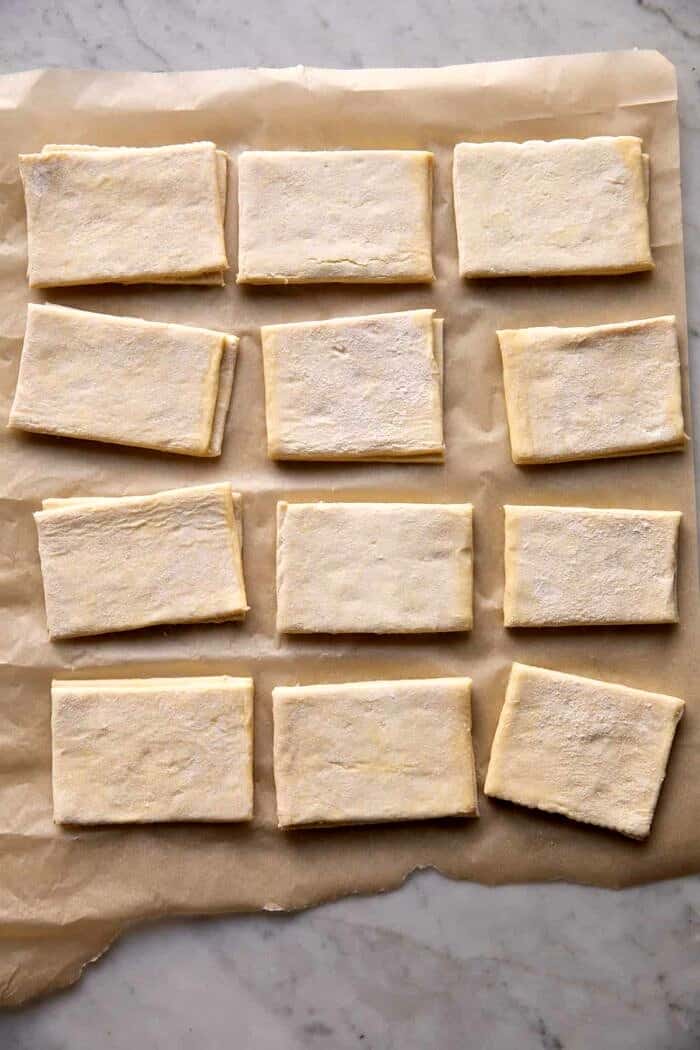 Pastry Wrapped Cranberry Baked Brie Bites | halfbakedharvest.com prep photo of pastry dough