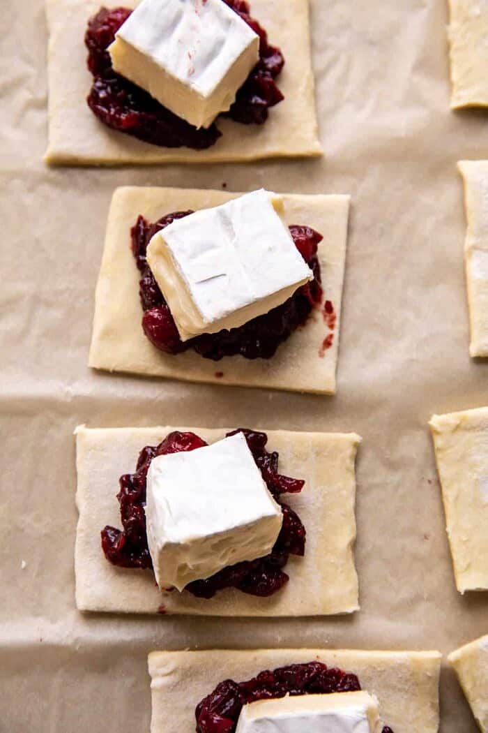 Pastry Wrapped Cranberry Baked Brie Bites | halfbakedharvest.com prep photo of Pastry Wrapped Cranberry Baked Brie Bites before baking