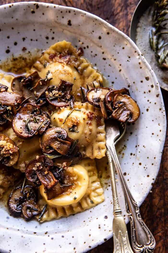 Rosemary Butter Mushroom and Cheese Ravioli | halfbakedharvest.com overhead close up photo of Rosemary Butter Mushroom and Cheese Ravioli
