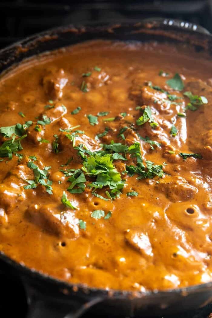 30 Minute Spicy Indian Butter Chicken | halfbakedharvest.com 30 Minute Spicy Indian Butter Chicken cooking in skillet