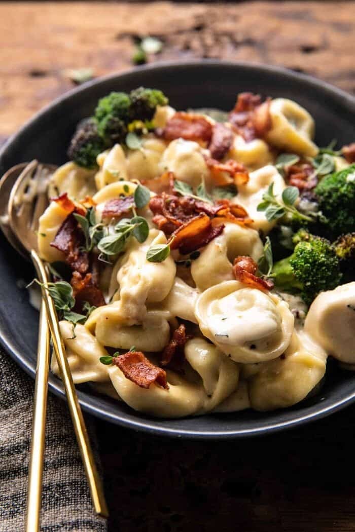 Creamy Bacon Tortellini with Charred Broccoli | halfbakedharvest.com side angled photo of Creamy Bacon Tortellini with Charred Broccoli
