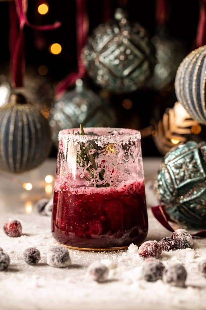 Frosted Mistletoe Margarita | halfbakedharvest.com half drunk Frosted Mistletoe Margarita