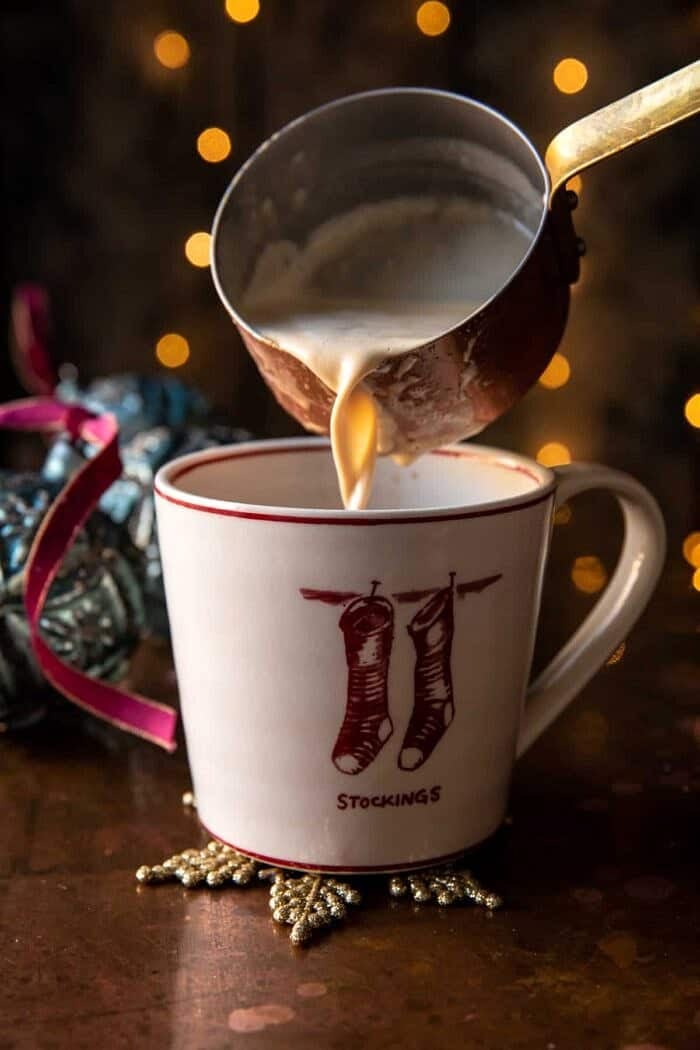 Salted Caramel Brulee Latte | halfbakedharvest.com prep photo of pouring latte