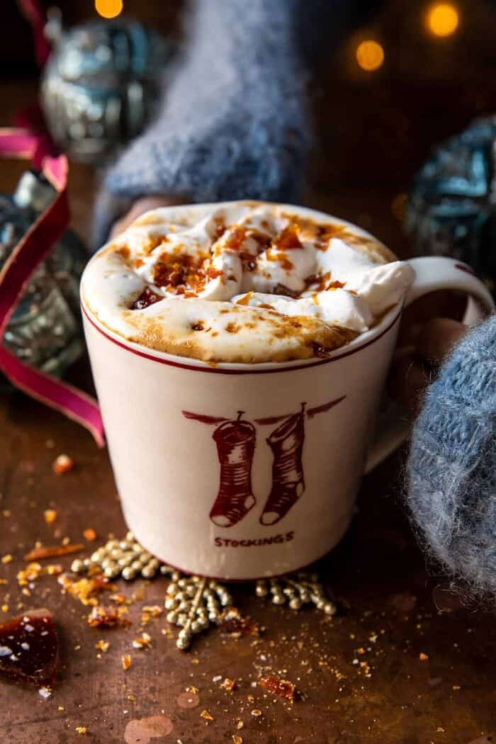 Salted Caramel Brulee Latte | halfbakedharvest.com Salted Caramel Brulee Latte with hands on mug