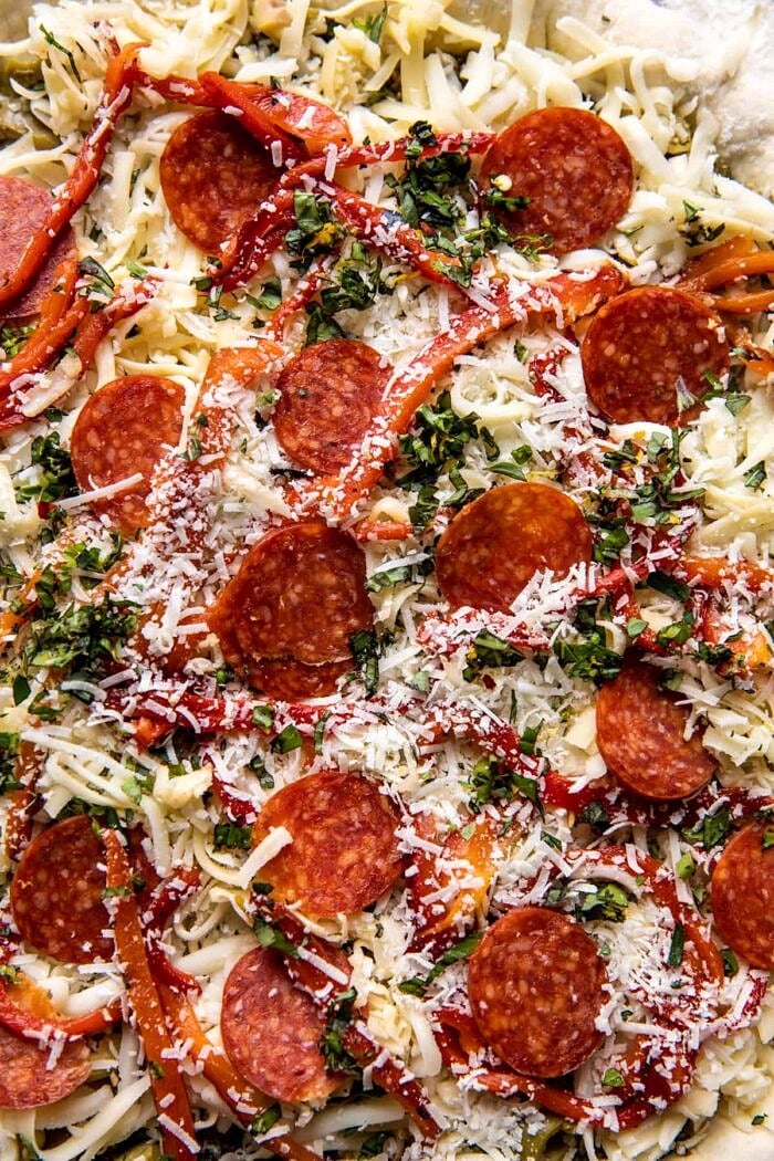 Pesto Pizza with Feta Stuffed Crust | halfbakedharvest.com