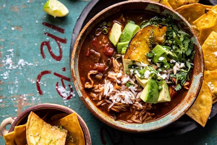 overhead horizontal photo of Slow Cooker Chipotle Chicken and Avocado Rice Soup