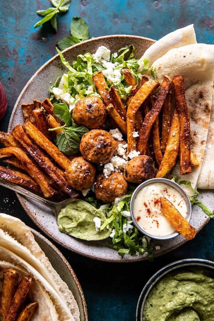 Chicken Meatball Pita Bowls with Seasoned Fries and Feta | halfbakedharvest.com overhead photo of Chicken Meatball Pita Bowls with Seasoned Fries and Feta
