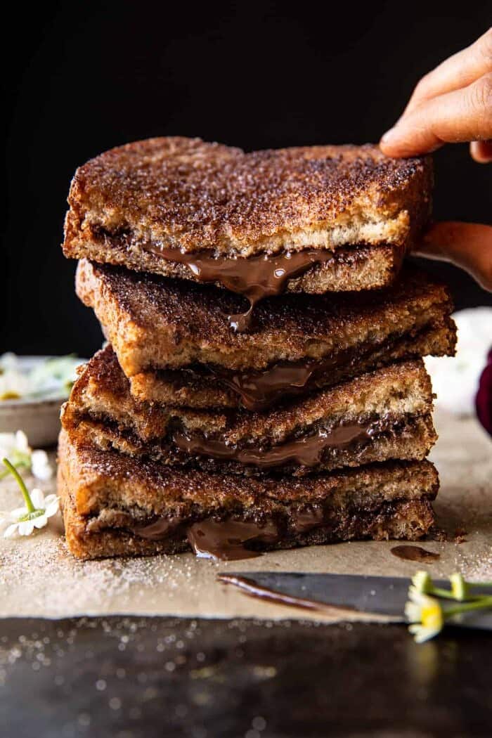 5 Minute Chocolate Cinnamon Sugar Toast | halfbakedharvest.com front facing photo of 5 Minute Chocolate Cinnamon Sugar Toast with sandwiches stacked