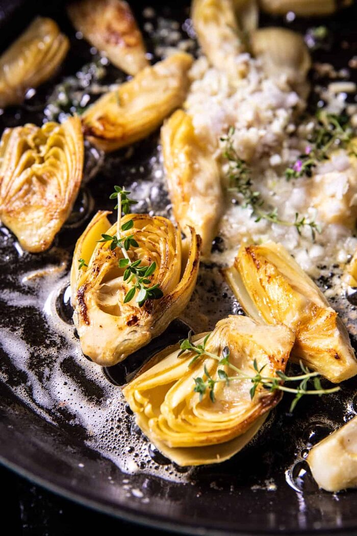 prep photo of artichokes cooking in skillet 