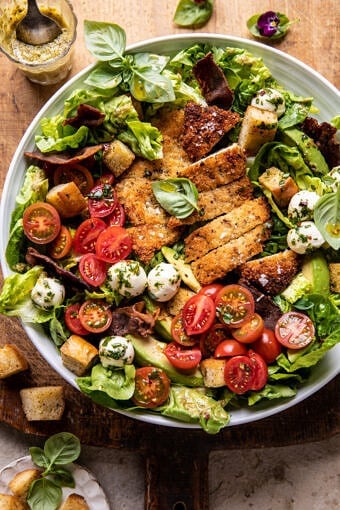 Crispy Italian Chicken and Bacon Salad with Tahini Pesto Dressing and Sourdough Croutons | halfbakedharvest.com