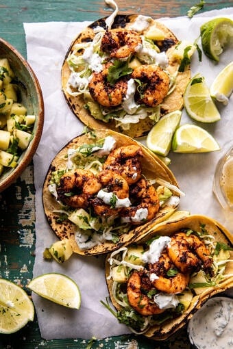 Sheet Pan Jalapeño Pineapple Shrimp Tacos with Cilantro Garlic Sauce | halfbakedharvest.com