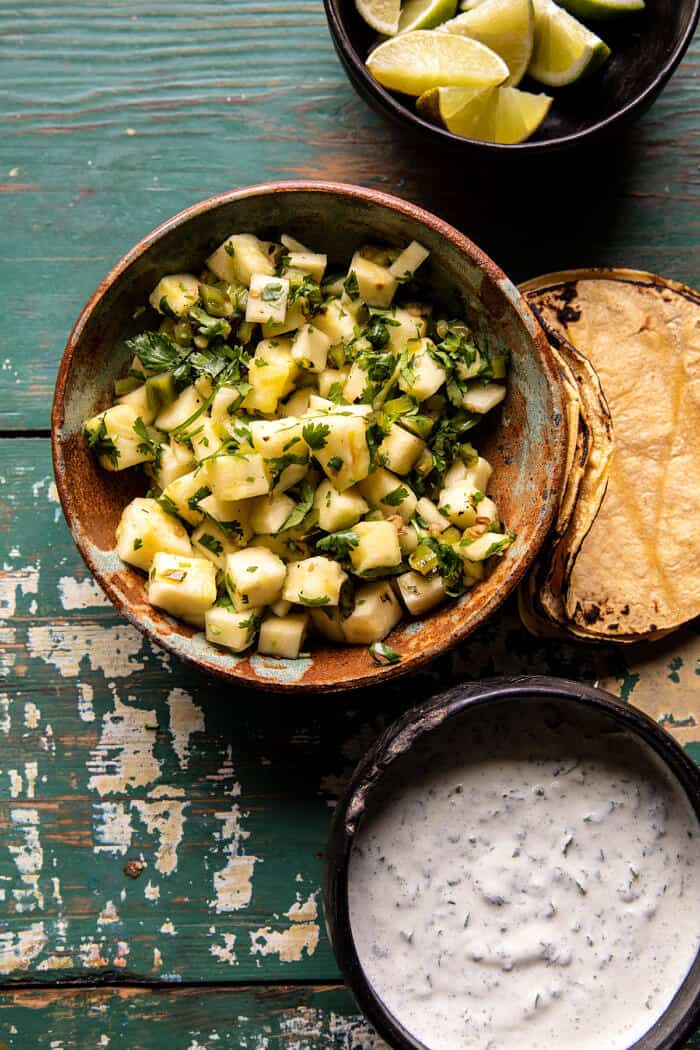 Sheet Pan Jalapeño Pineapple Shrimp Tacos with Cilantro Garlic Sauce | halfbakedharvest.com photo of pineapple salsa