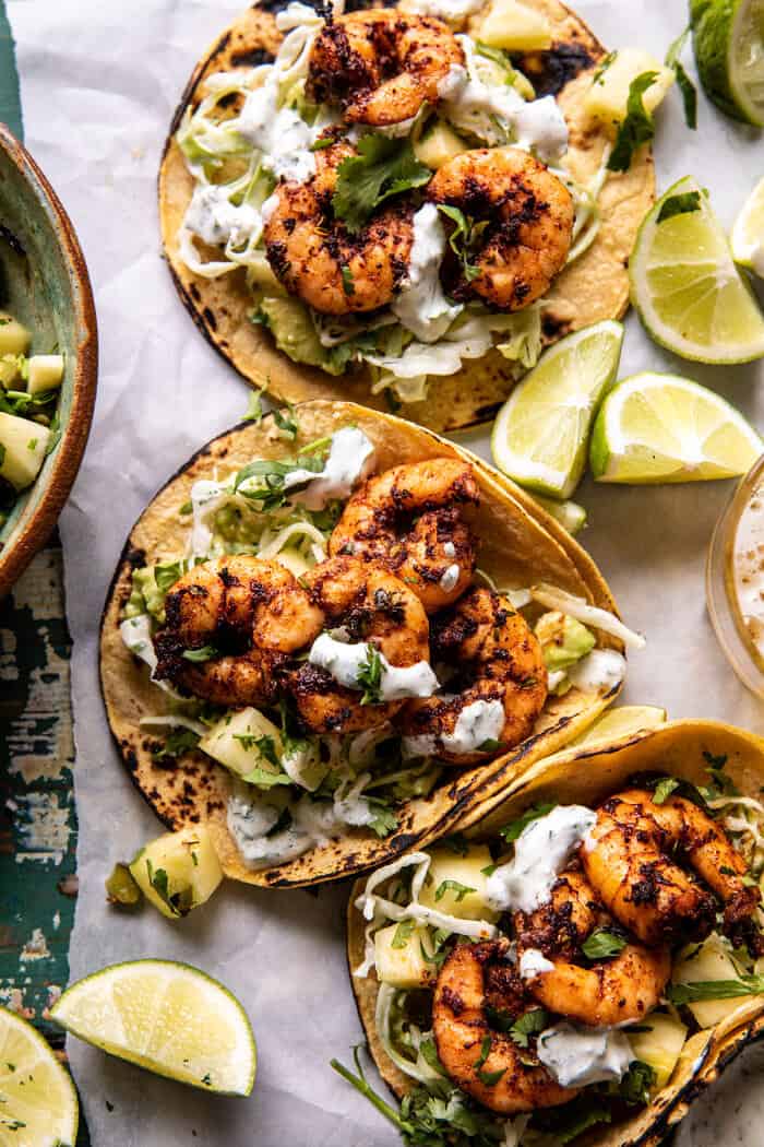 Sheet Pan Jalapeño Pineapple Shrimp Tacos with Cilantro Garlic Sauce | halfbakedharvest.com