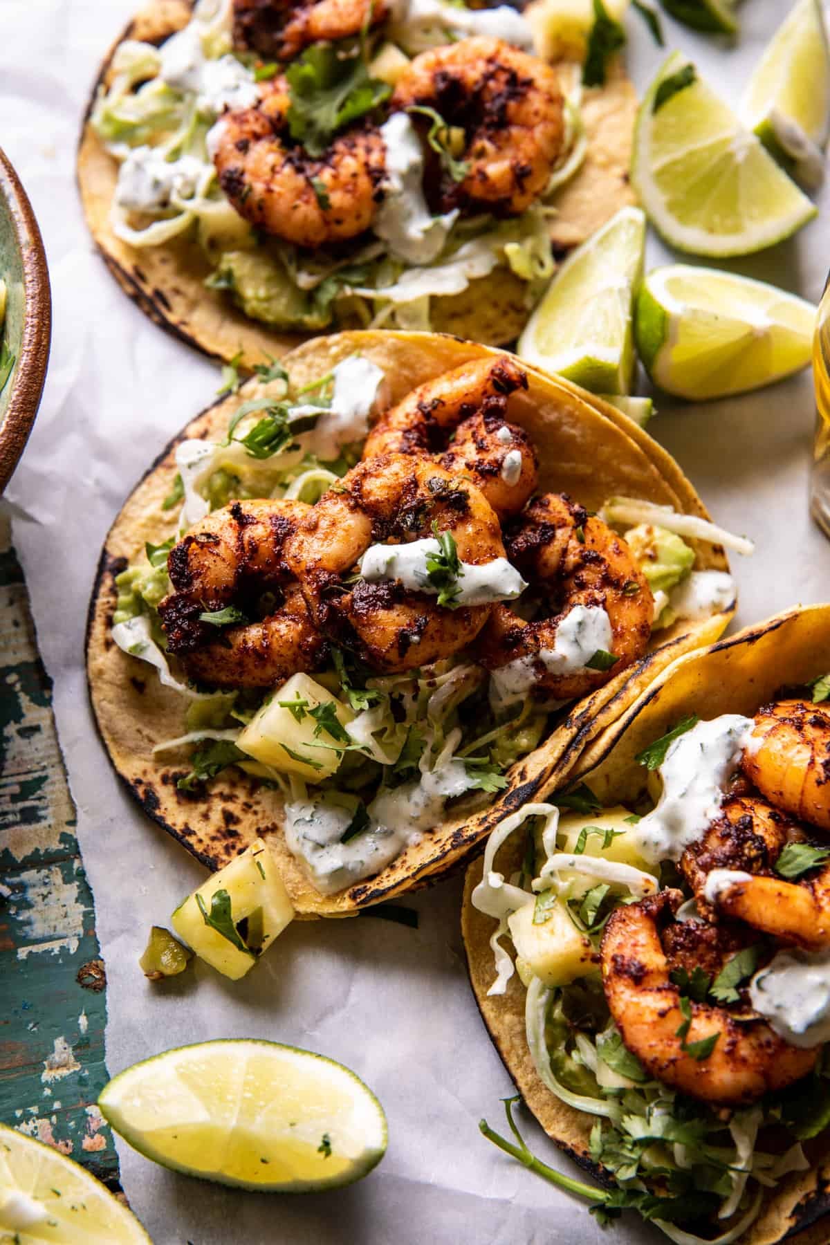 Sheet Pan Jalapeño Pineapple Shrimp Tacos with Cilantro Garlic Sauce | halfbakedharvest.com