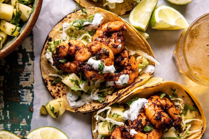 Sheet Pan Jalapeño Pineapple Shrimp Tacos with Cilantro Garlic Sauce | halfbakedharvest.com