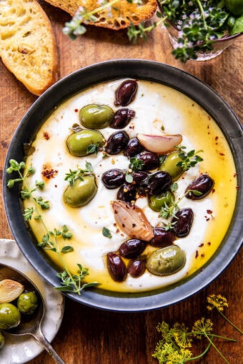 Honey Whipped Feta with Garlic Herb Roasted Olives | halfbakedharvest.com