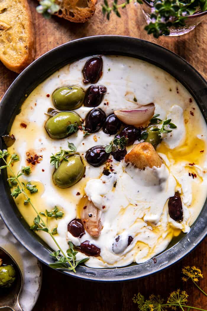 Honey Whipped Feta with Garlic Herb Roasted Olives | halfbakedharvest.com