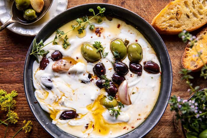 Honey Whipped Feta with Garlic Herb Roasted Olives | halfbakedharvest.com