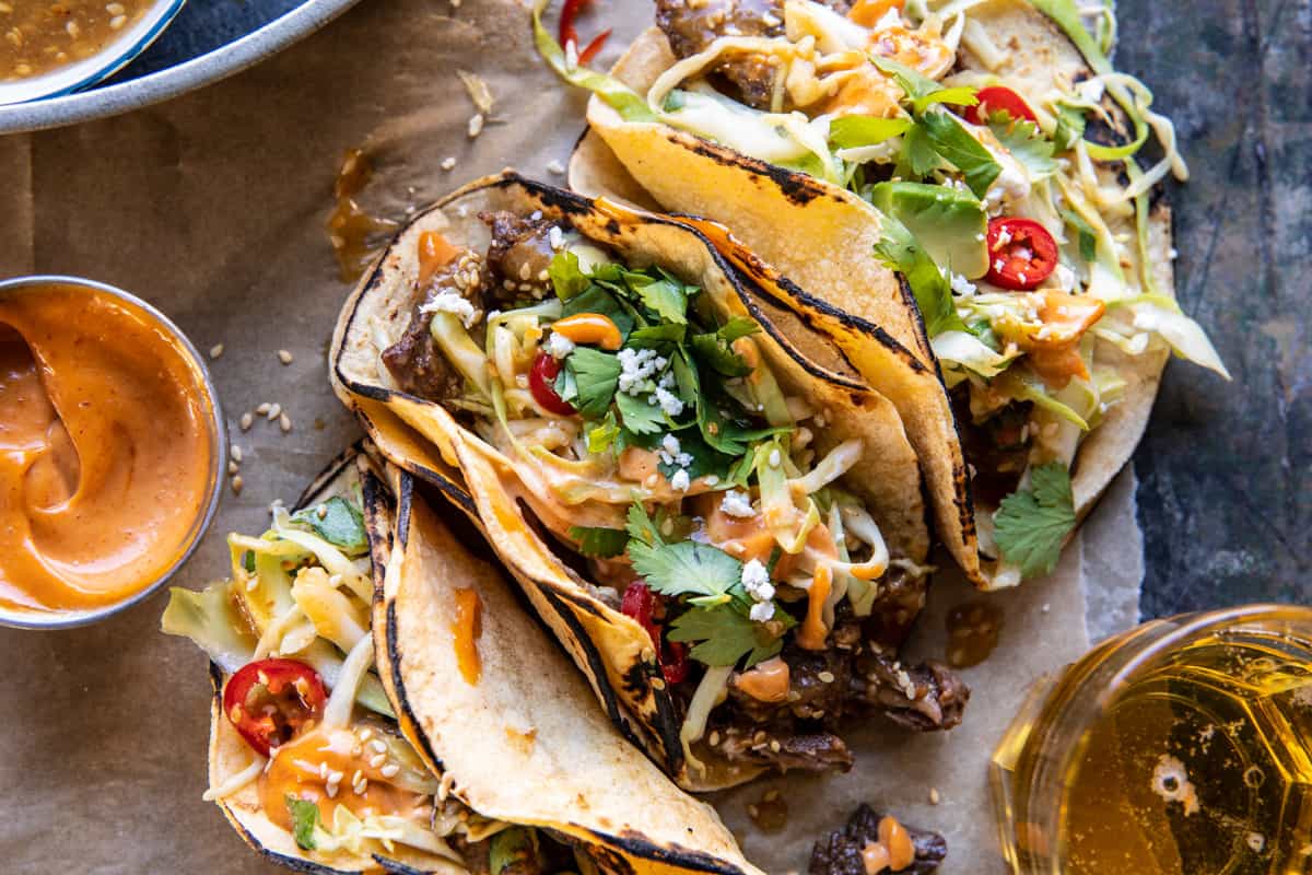Crockpot Korean Inspired Tacos with Yum Yum Yummm Sauce | halfbakedharvest.com