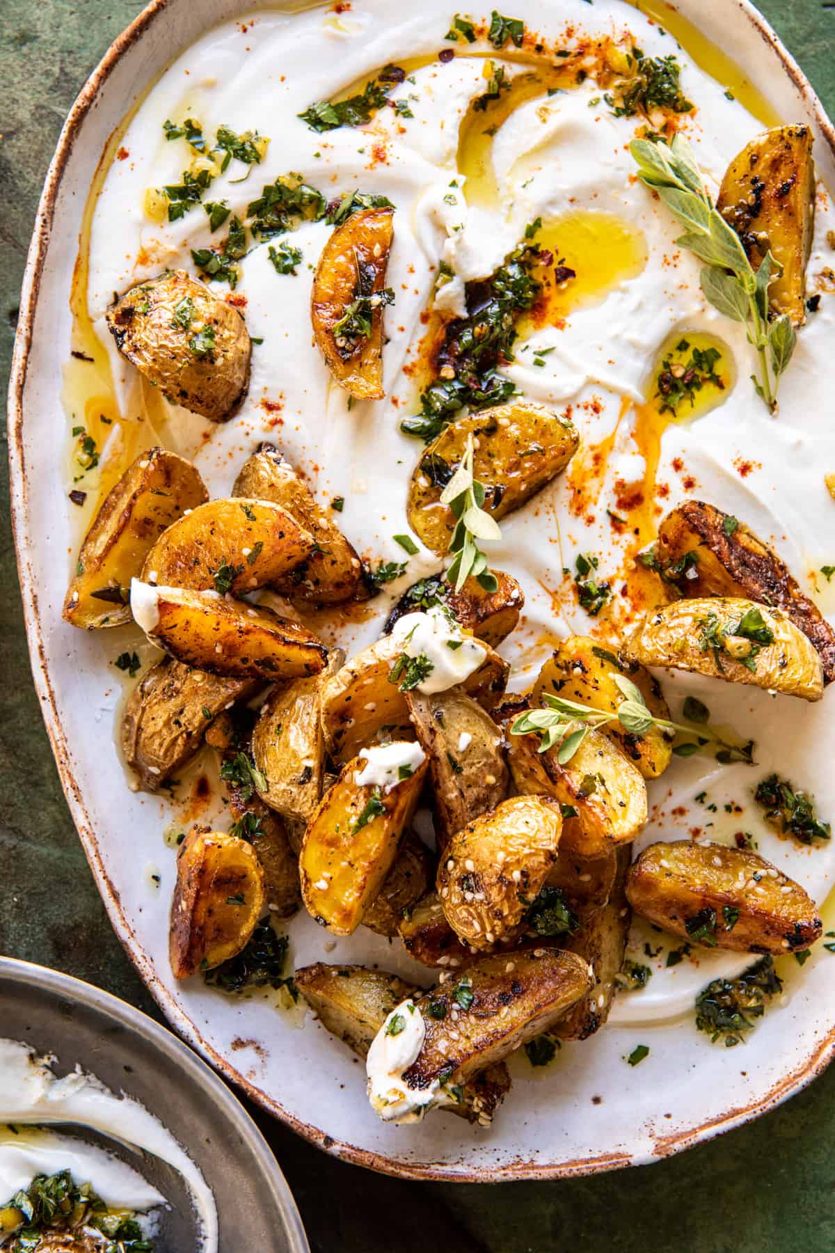 Crispy Oregano Roasted Potatoes with Creamy Feta Sauce | halfbakedharvest.com