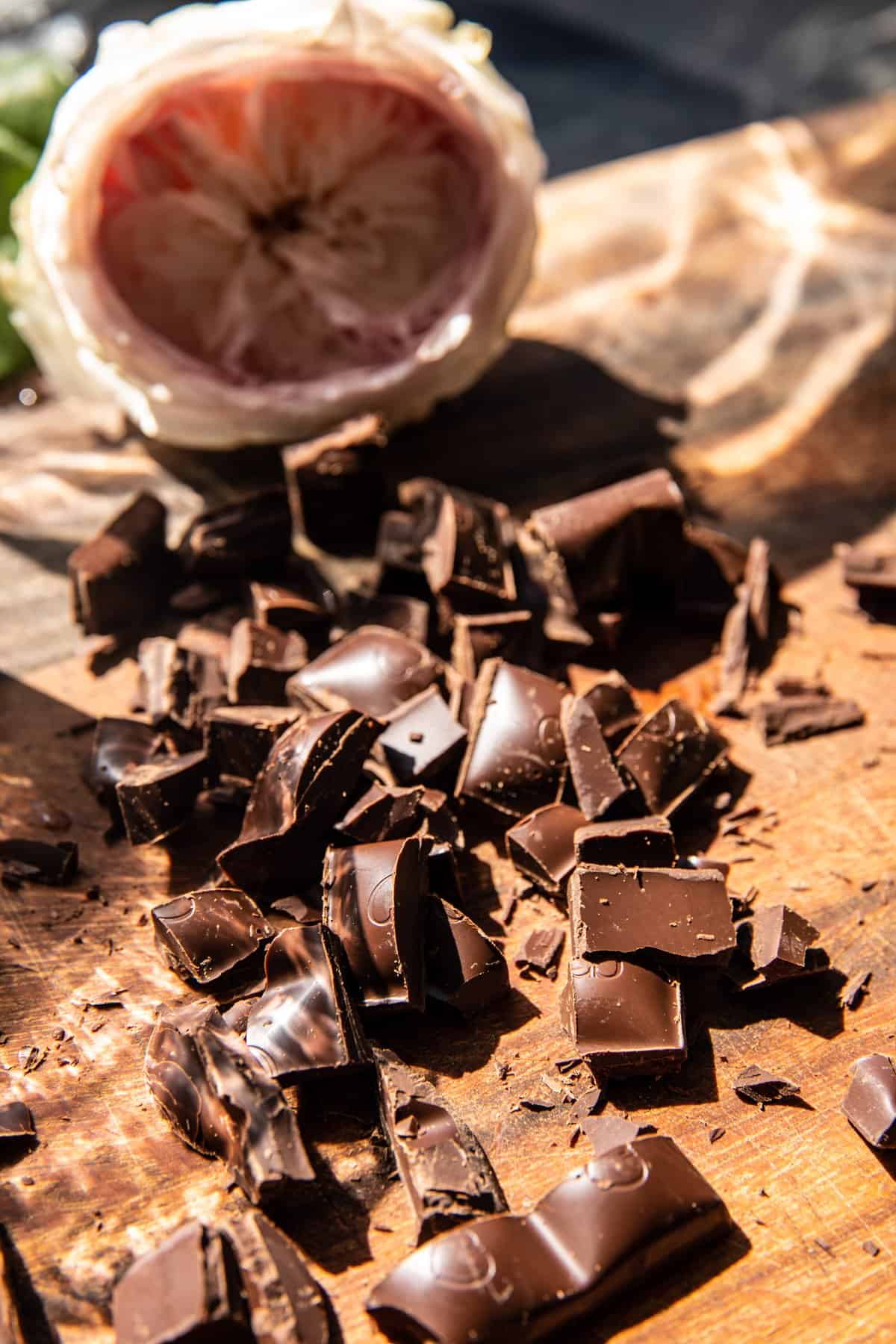 chopped chocolate on cutting board 