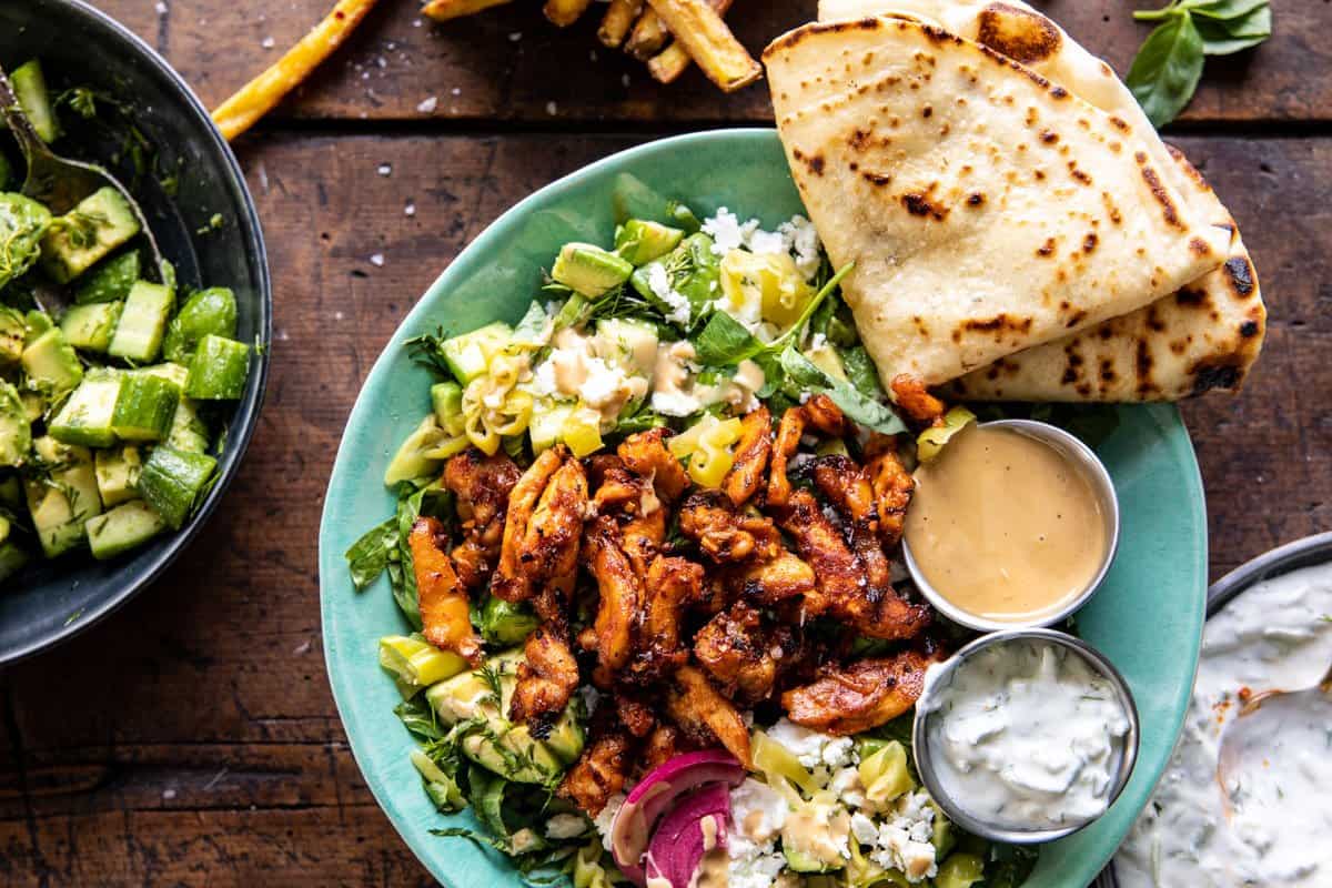 Greek Chicken Tzatziki bowl with naan and fries