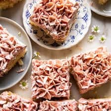 overhead photo of lemon cake cute into square pieces