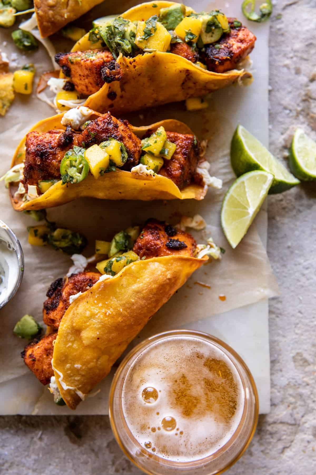 Crispy BBQ Salmon Tacos with Avocado Mango Salsa and Jalapenฬo Cream | halfbakedharvest.com