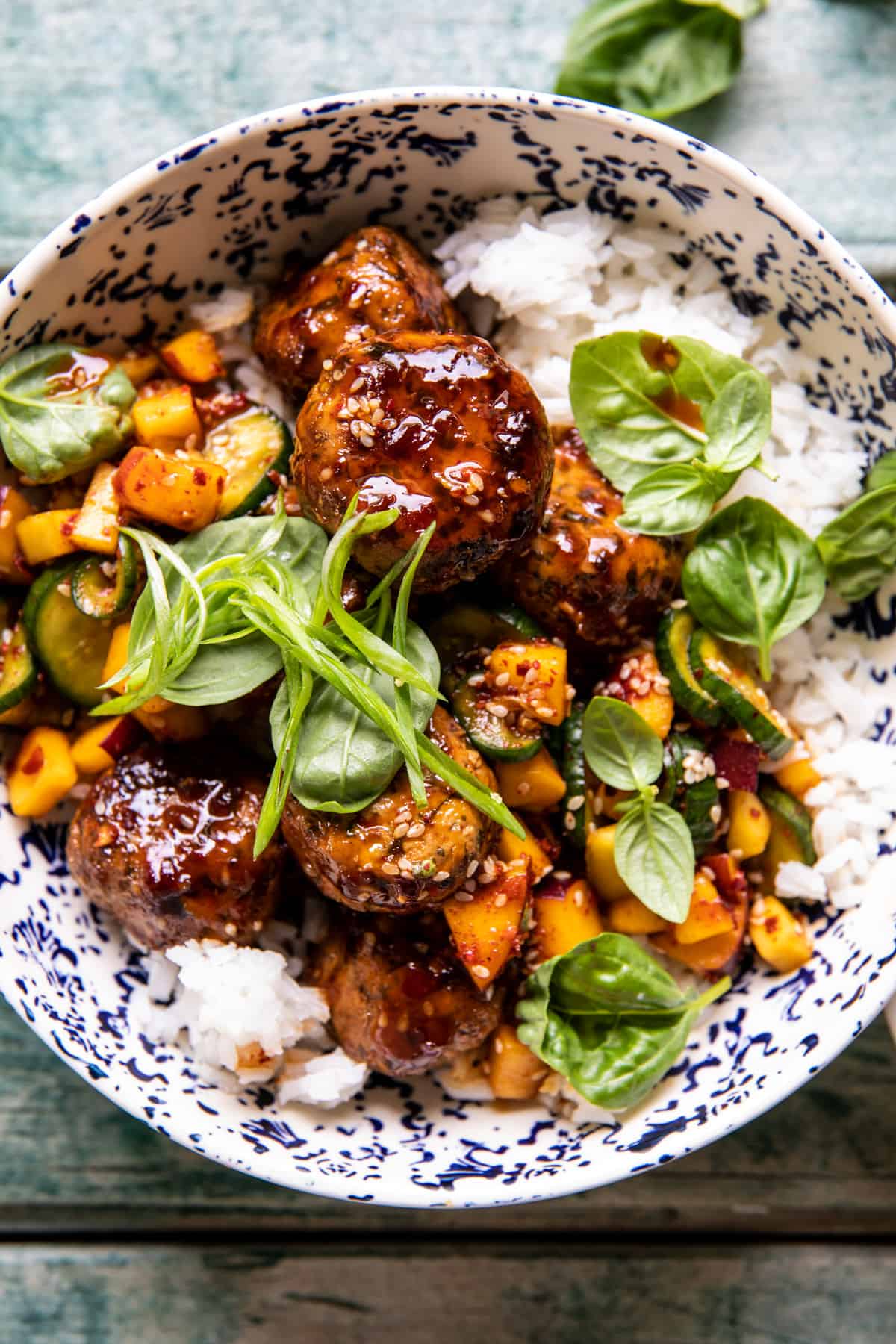 Sweet and Spicy Sesame Meatball Bowl with Mango Cucumber Salad | halfbakedharvest.com