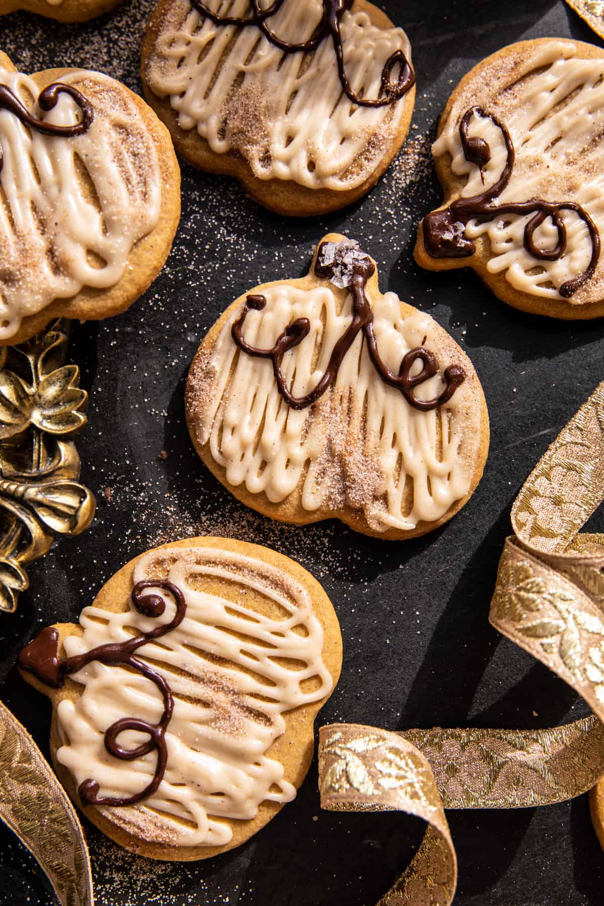 Soft Pumpkin Sugar Cookies with Cinnamon Brown Butter Frosting | halfbakedharvest.com