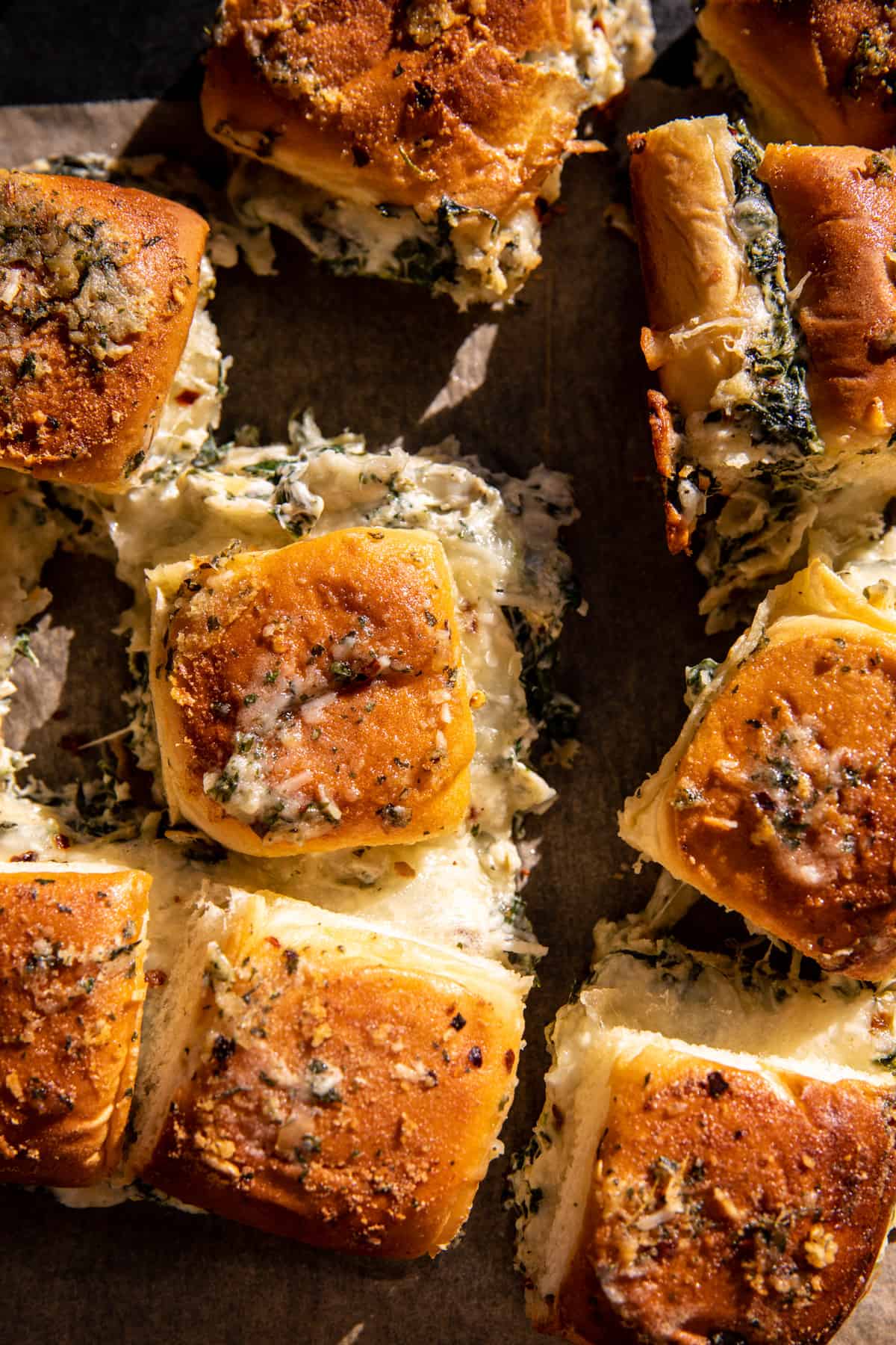 Pull Apart Garlic Butter Spinach and Artichoke Dip Sliders | halfbakedharvest.com