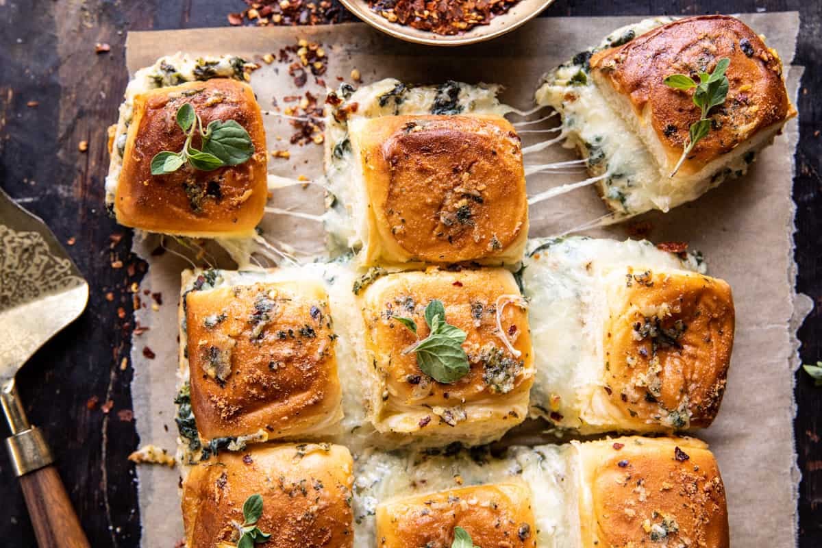 Pull Apart Garlic Butter Spinach and Artichoke Dip Sliders | halfbakedharvest.com
